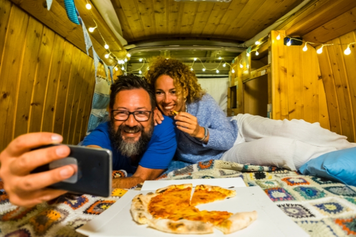 couple on a video call inside an rv