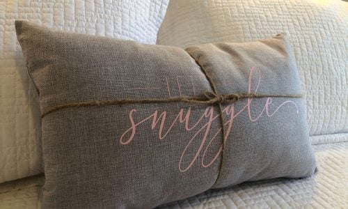 Tiny Home Stays 186 tiny house grey and white pillows
